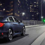 2021 honda civic driving down city road