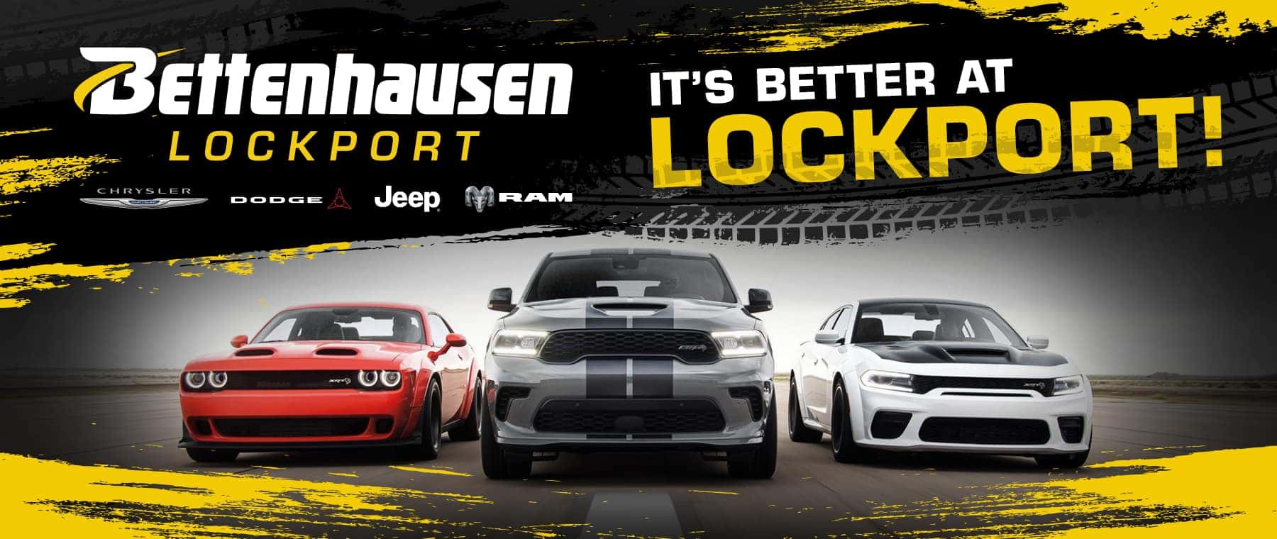 Dodge lineup of a Durango, Challenger and Charger racing down a road