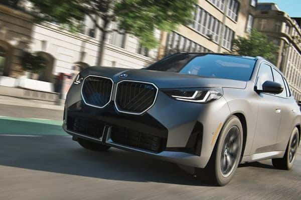 Close-up of a BMW X3's front grille while driving