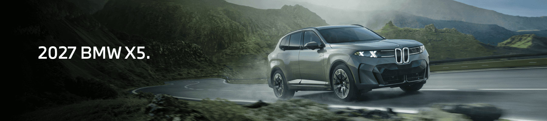 2027 BMW X5 front three-quarter view driving on a mountain road