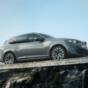 2027 BMW X5 driving on the road