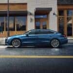 Side view of a Hyundai Sonata parked on the side of a street