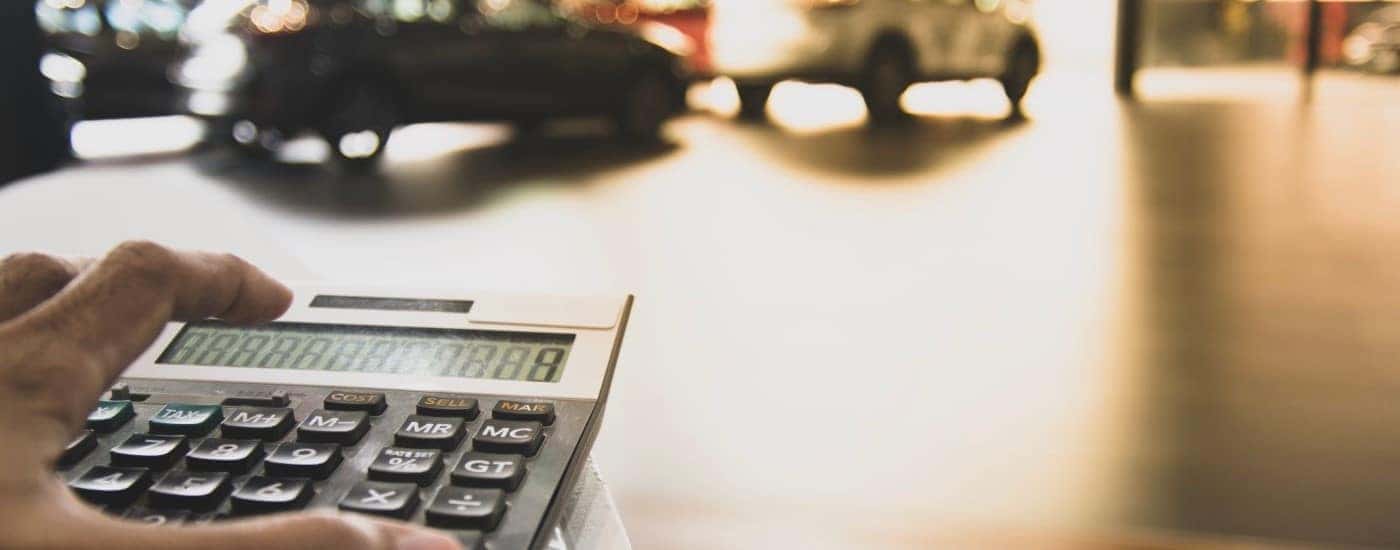 Calculating service costs at a dealership.