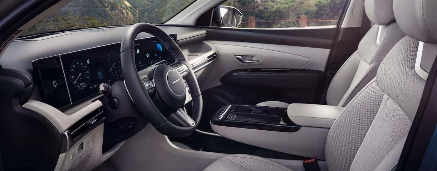 Black and white interior and dash in a 2025 Hyundai Tucson.
