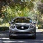 A grey 2020 Buick Envision is shown from the front after leaving a Kentucky used car dealership.