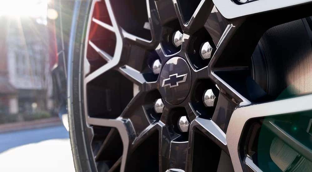 A close up of the black and silver rim on a 2024 Chevy Blazer for sale is shown.