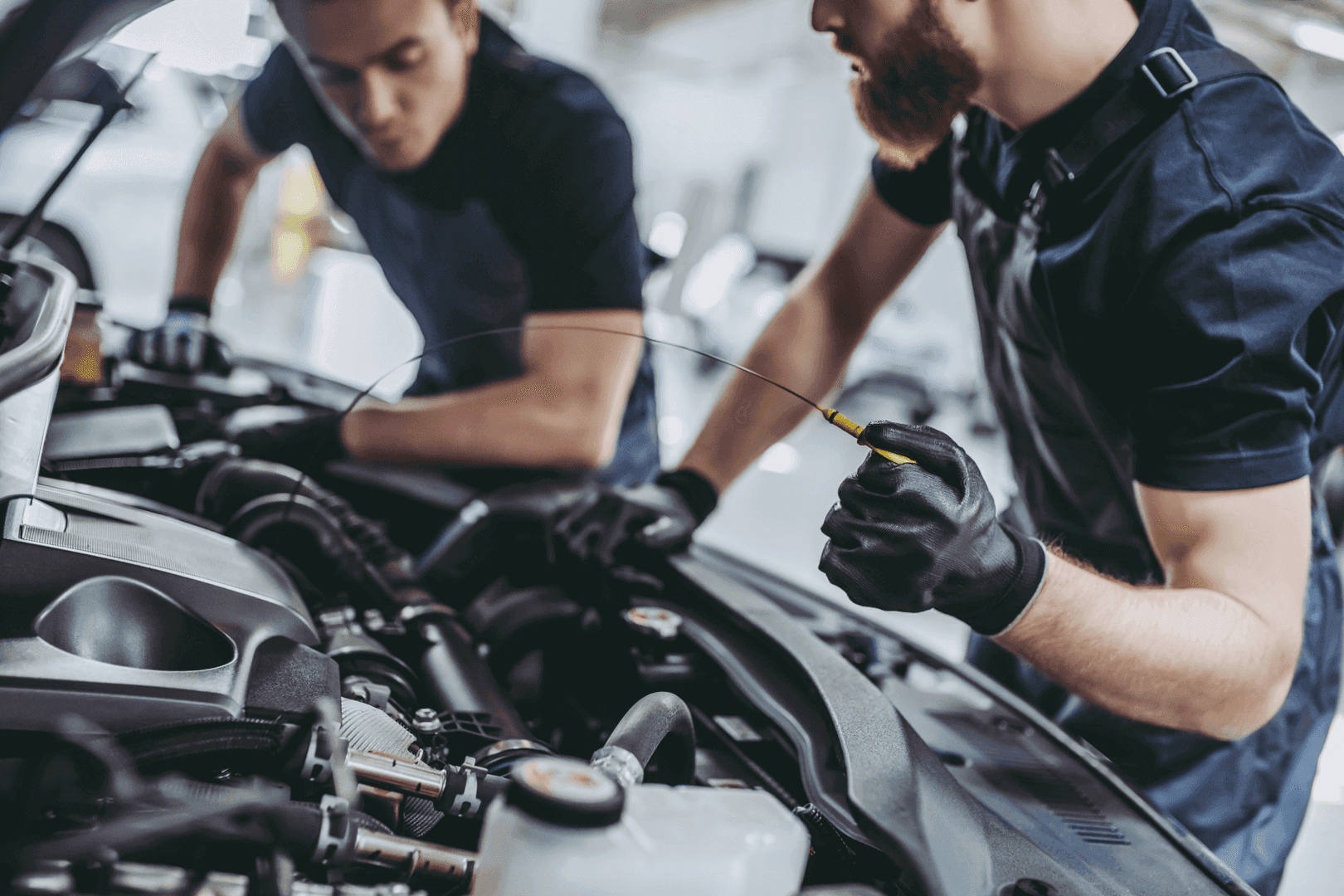 Certified Volkswagen technician performing an oil change at Germain Volkswagen of Westerville