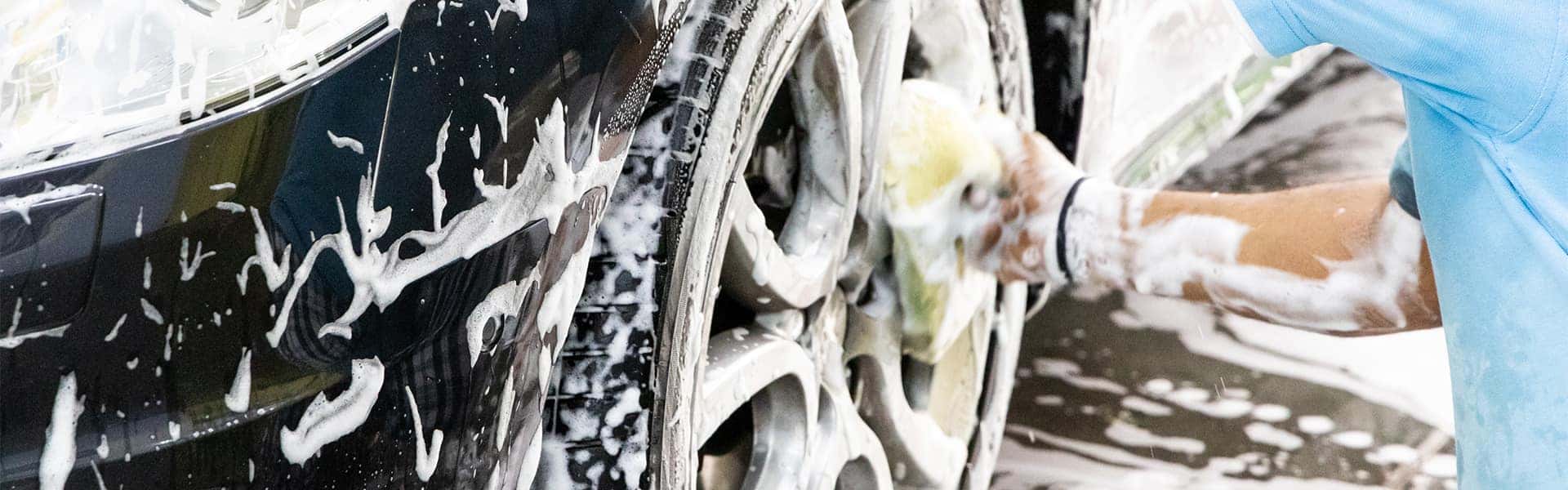 Tips for spring cleaning your car at Halterman's Toyota in East Stroudsburg | Man Washing Exterior of Vehicle