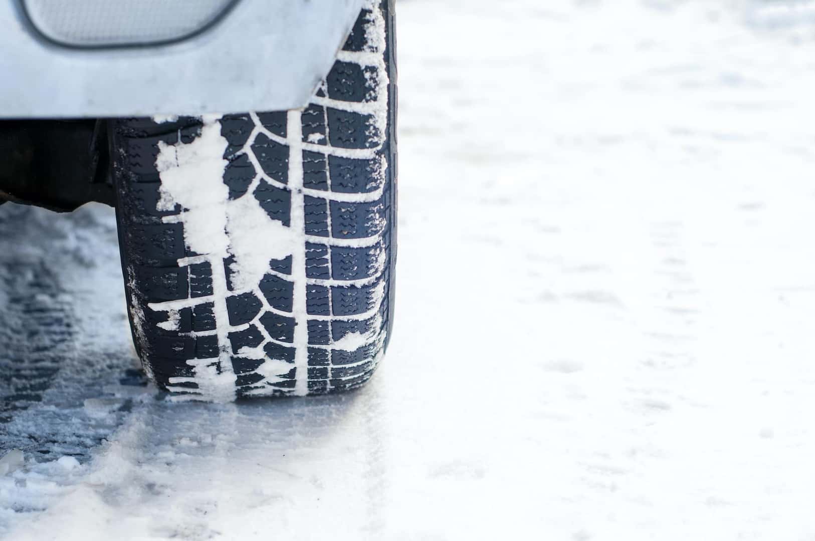 How to prepare your Toyota for the winter season at Halterman's Toyota in East Stroudsburg, PA | Closeup of vehicle tire in the snow