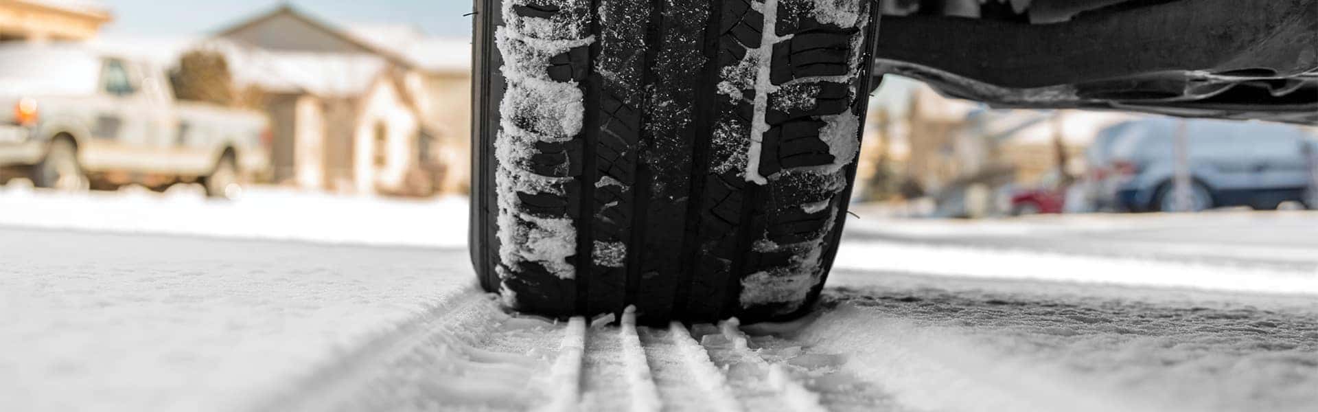 what different tire options are available at Halterman's Toyota in East Stroudsburg | Winter Tires Driving On Top of Thin Layer of Snow