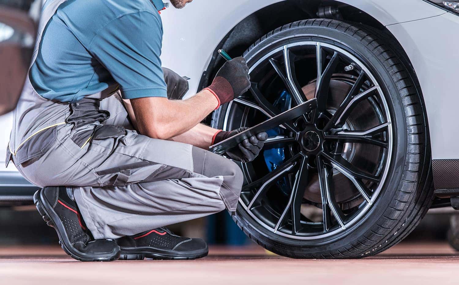 How to check your tires' health at Halterman's Toyota of East Stroudsburg | Service technician inspecting tires