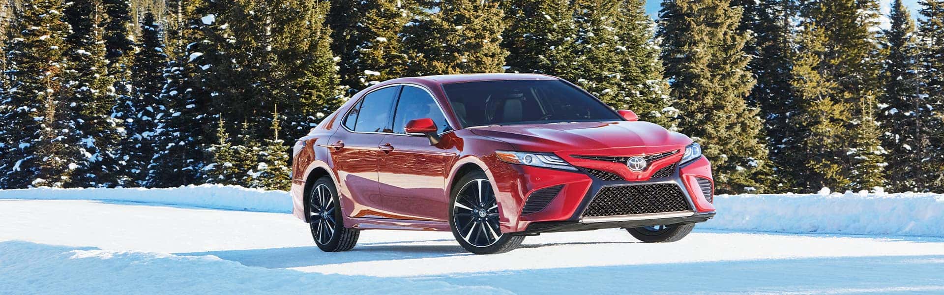 The Cold Facts of Winter Tires at Halterman's Toyota in East Stroudsburg, PA | Red Toyota Camry AWD Driving in Snowy Weather