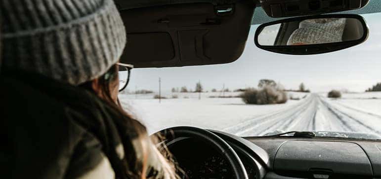 The Cold Facts of Winter Tires at Halterman's Toyota in East Stroudsburg, PA | Woman Driving Car in Snowy Conditions