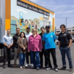 Hoehn Team members stand with the Computers 2 Kids Team