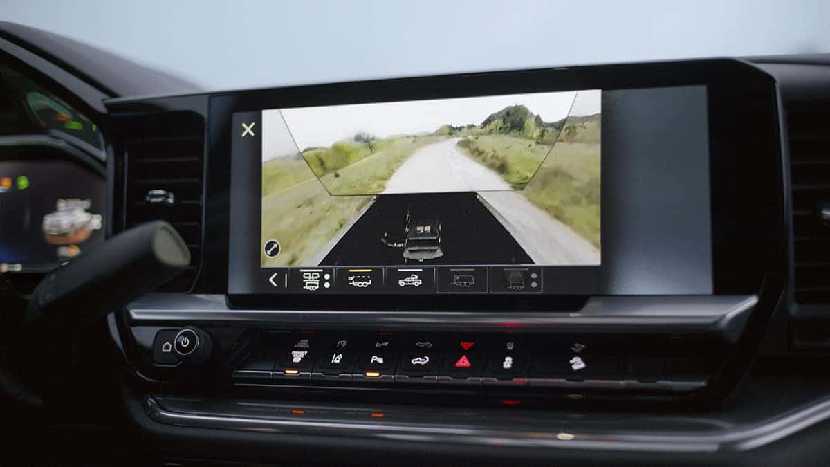 2026 Chevrolet Silverado HD interior dashboard with 13.4-inch touchscreen and trailer camera interface