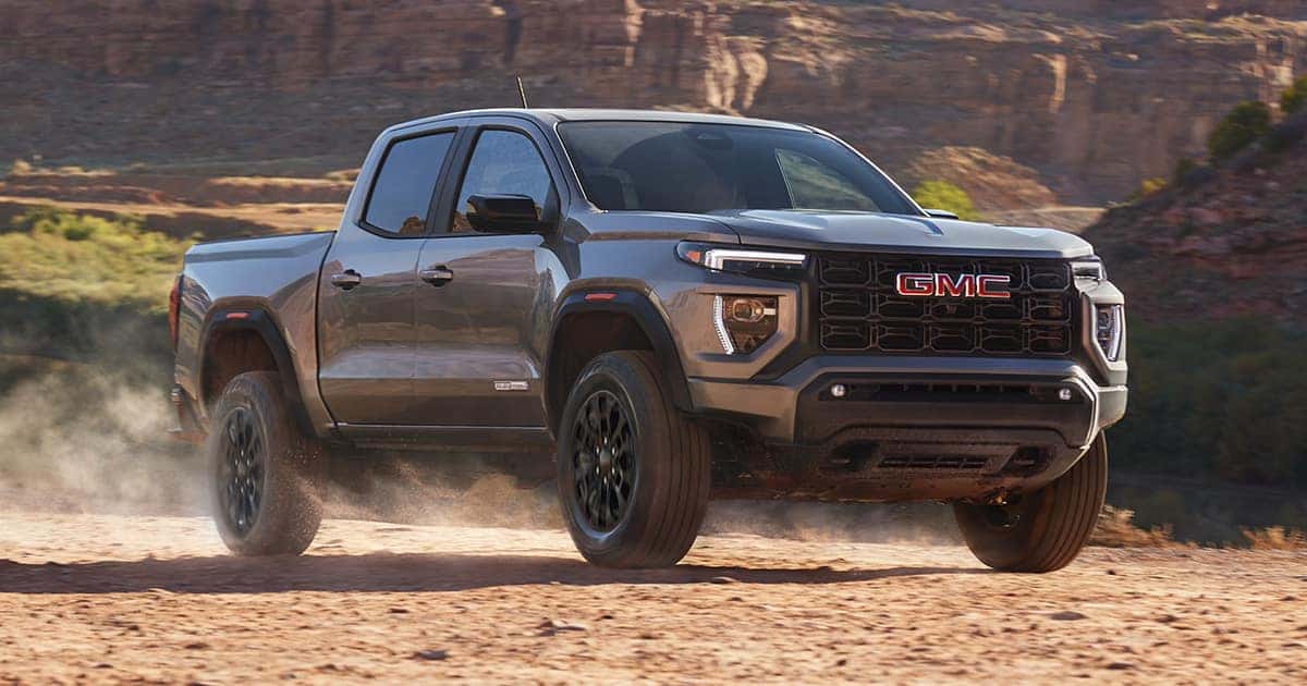 2026 GMC Canyon Crew Cab 4x4 exterior profile against red rock terrain