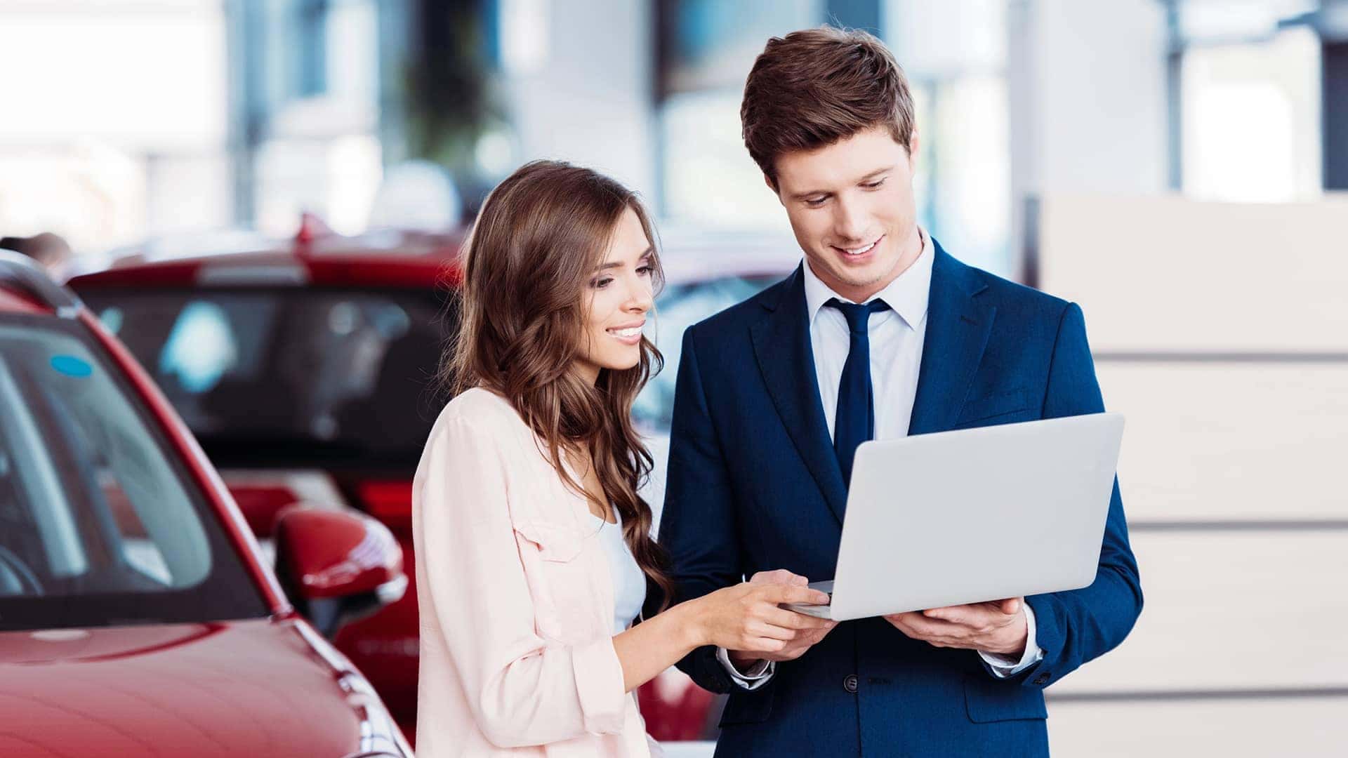 talking to customer at dealership