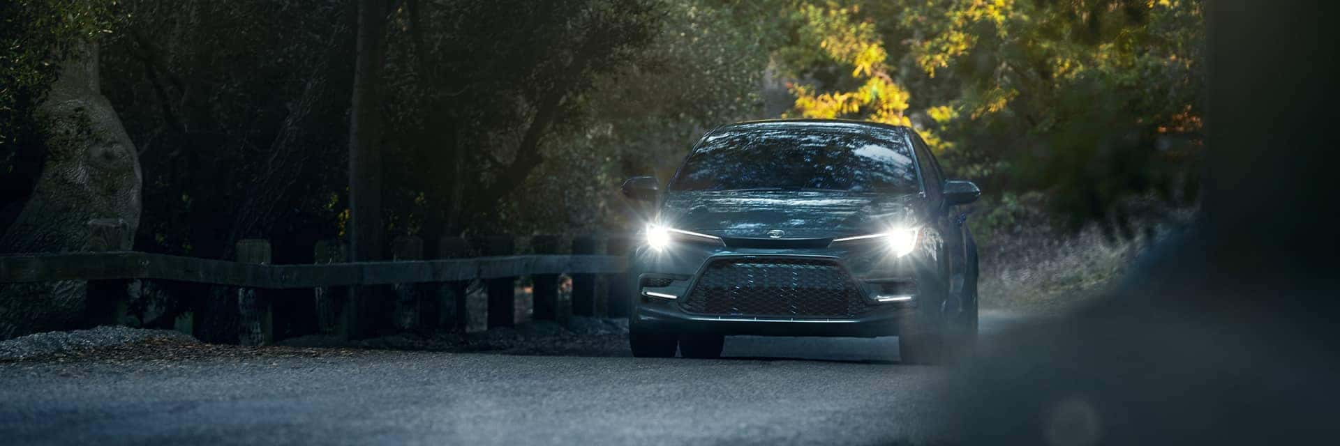 2026 toyota corolla driving in dark rainy weather