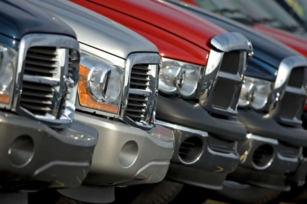used dodge ram trucks parked on used car lot in las vegas, nevada