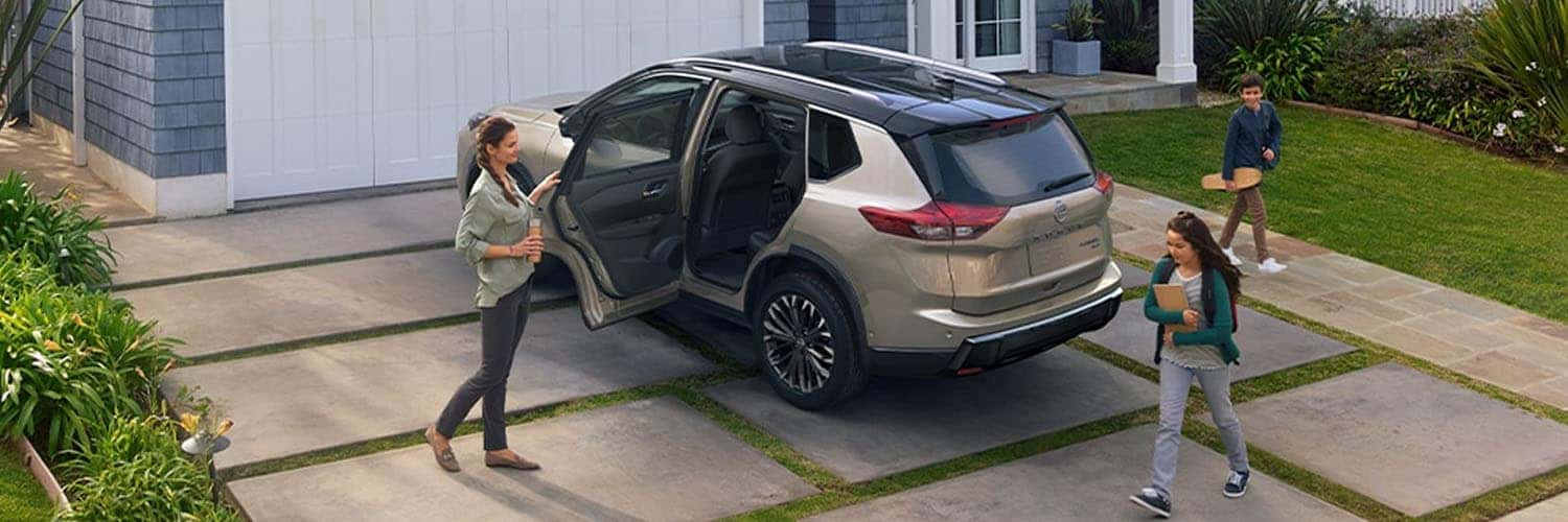 2026 Nissan Rogue Champagne Silver Metalalic Exterior Color Rear View Image Cleveland Ohio