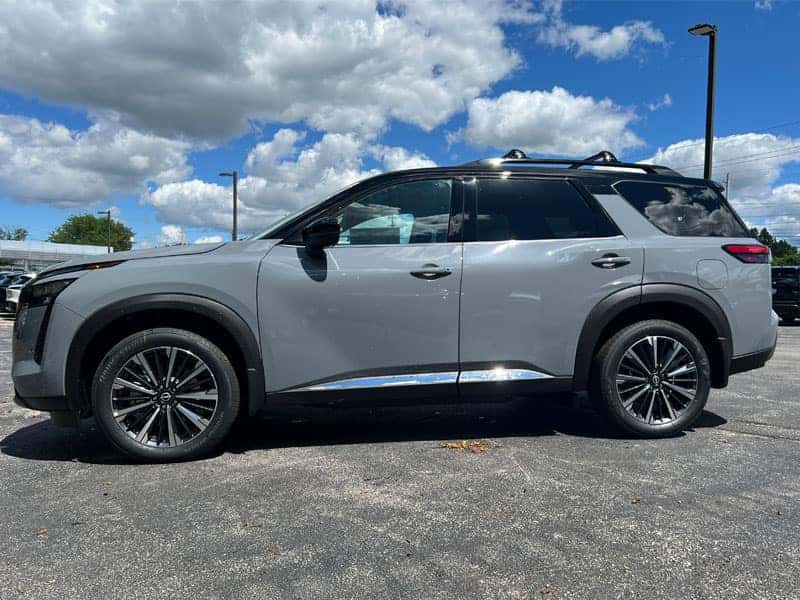2026 Nissan Pathfinder Two-Tone Boulder Gray Pearl exterior color driver side view near Cleveland Ohio