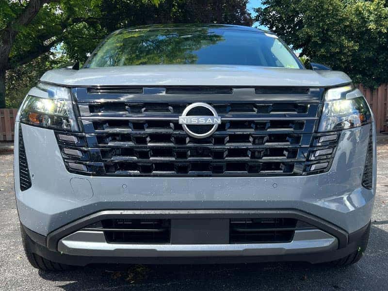 2026 Nissan Pathfinder Two-Tone Boulder Gray Pearl exterior color front close up view near Cleveland Ohio
