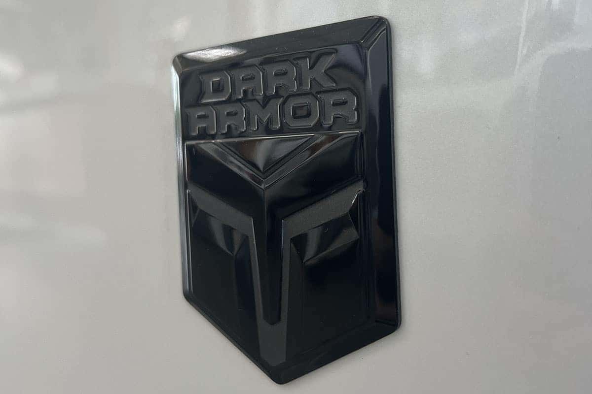 2026 Nissan Rogue Dark Armor Edition badge logo near Cleveland, Ohio