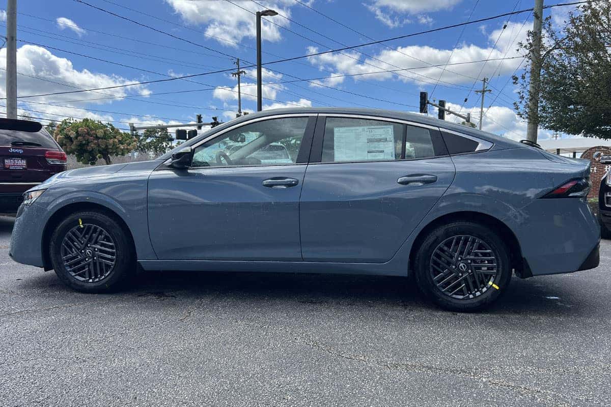 2027 Nissan Sentra Atlantic Gray Metallic exterior color driver side view near Cleveland, Ohio