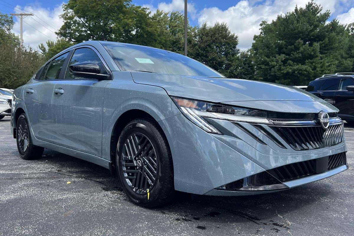 2027 Nissan Sentra Atlantic Gray Metallic exterior color passenger side three-quarter view near Cleveland, Ohio