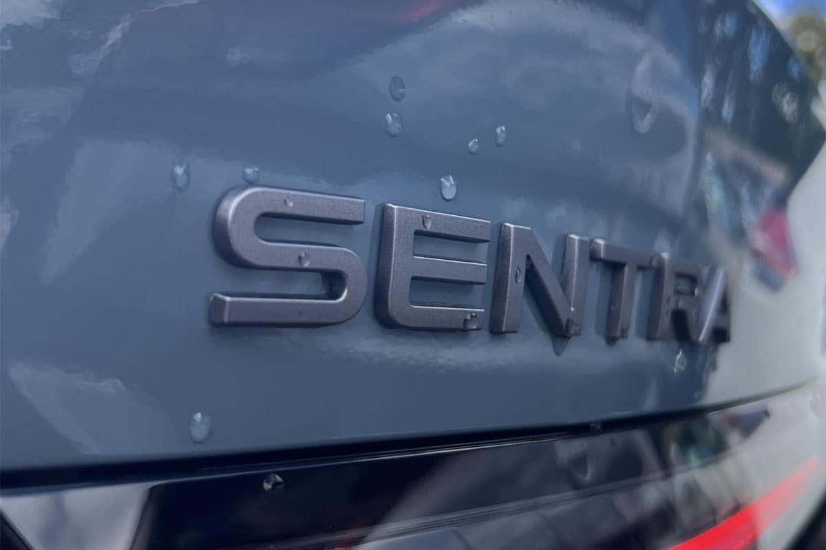 2027 Nissan Sentra Atlantic Gray Metallic exterior color sentra logo view near Cleveland, Ohio