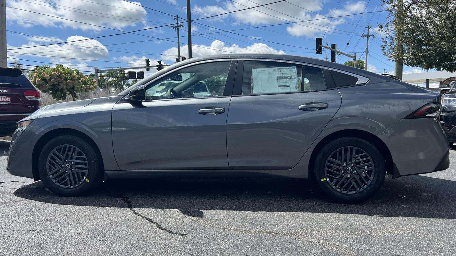 2027 Nissan Sentra Gun Metallic driver side exterior view near Cleveland, Ohio