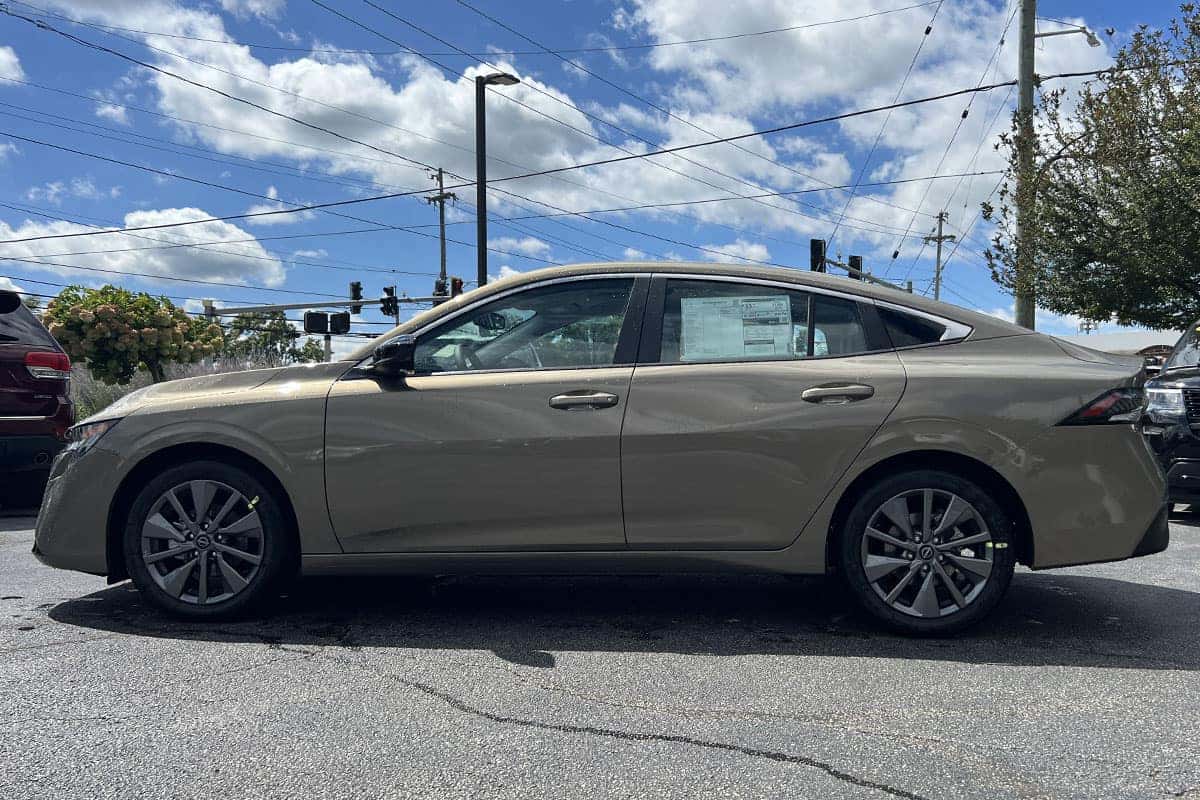 2027 Nissan Sentra Imperial Bronze exterior color side view near Cleveland, Ohio