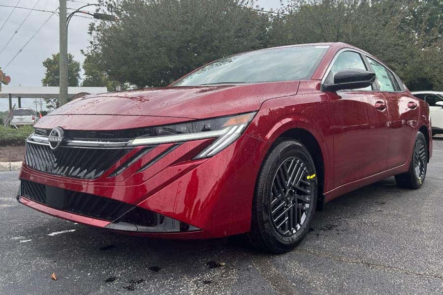 Red 2027 Nissan Sentra Scarlet Ember Tintcoat exterior near Cleveland Ohio
