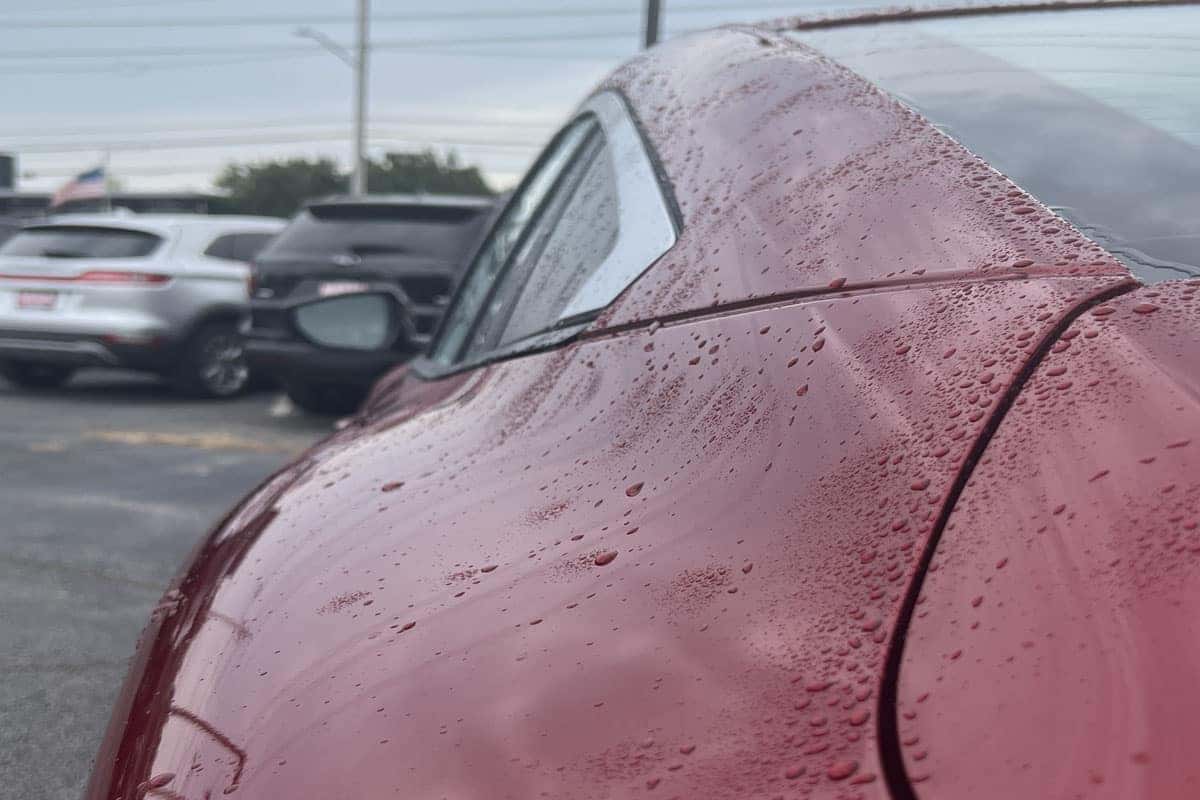 Close up of the 2027 Nissan Sentra Scarlet Ember red exterior color near Cleveland, Ohio