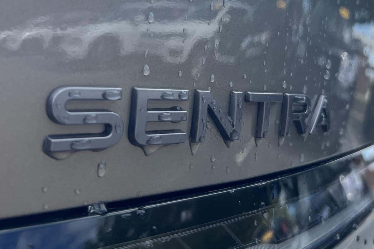 Close-up view of the Imperial Bronze exterior color on the rear of the 2027 Nissan Sentra at Nissan of North Olmsted near Cleveland, Ohio.