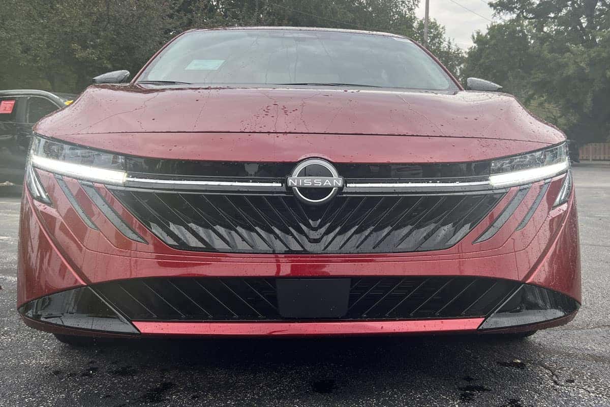 Front bumper view of the 2027 Nissan Sentra Scarlet Ember Red exterior color near Cleveland, Ohio