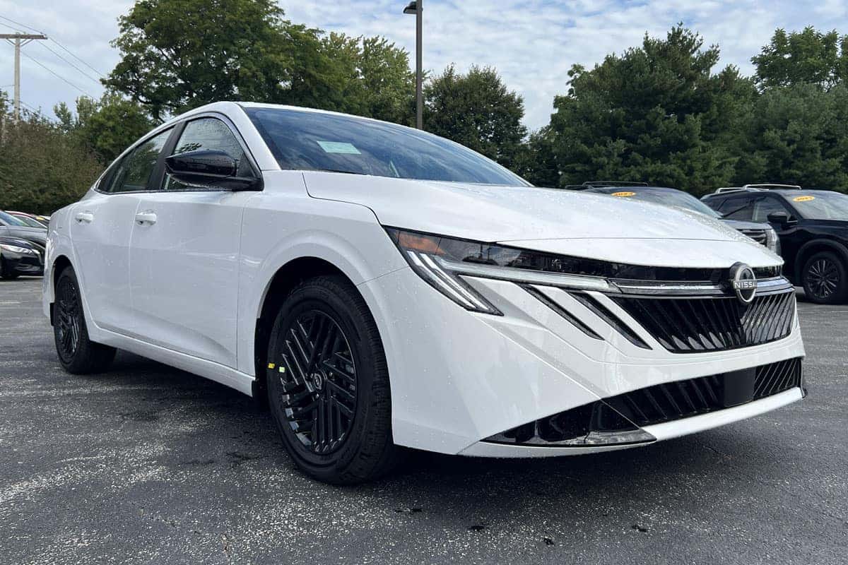 Front passenger side view of the 2027 Nissan Sentra Fresh Powder exterior color near Cleveland, Ohio