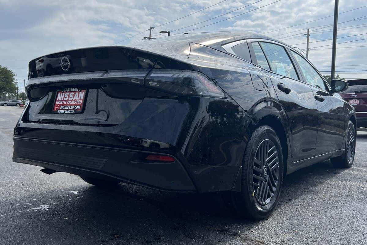 2027 Nissan Sentra Black exterior color driver side view near Cleveland, Ohio