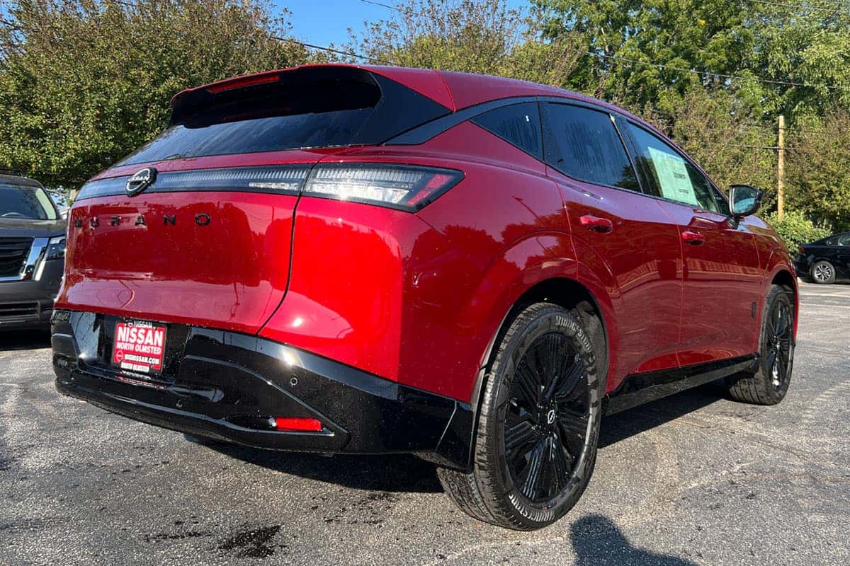 Rear three-quarter view of the red 2027 Nissan Murano in Scarlet Ember Tintcoat near Cleveland, Ohio