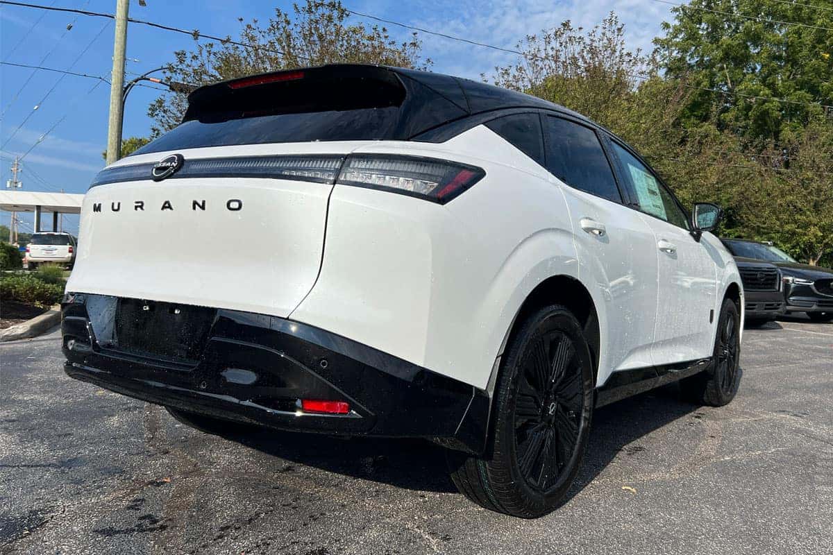 Rear passenger side three-quarter view of the 2027 Nissan Murano Two-Tone Everest White exterior color near Cleveland, Ohio