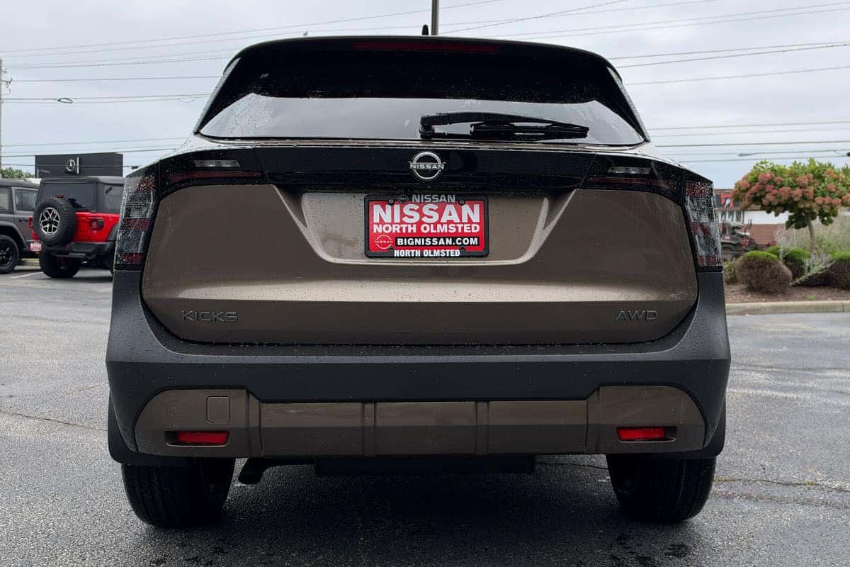 Rear view of a 2027 Nissan Kicks in Canyon Bronze Metallic near Cleveland, Ohio