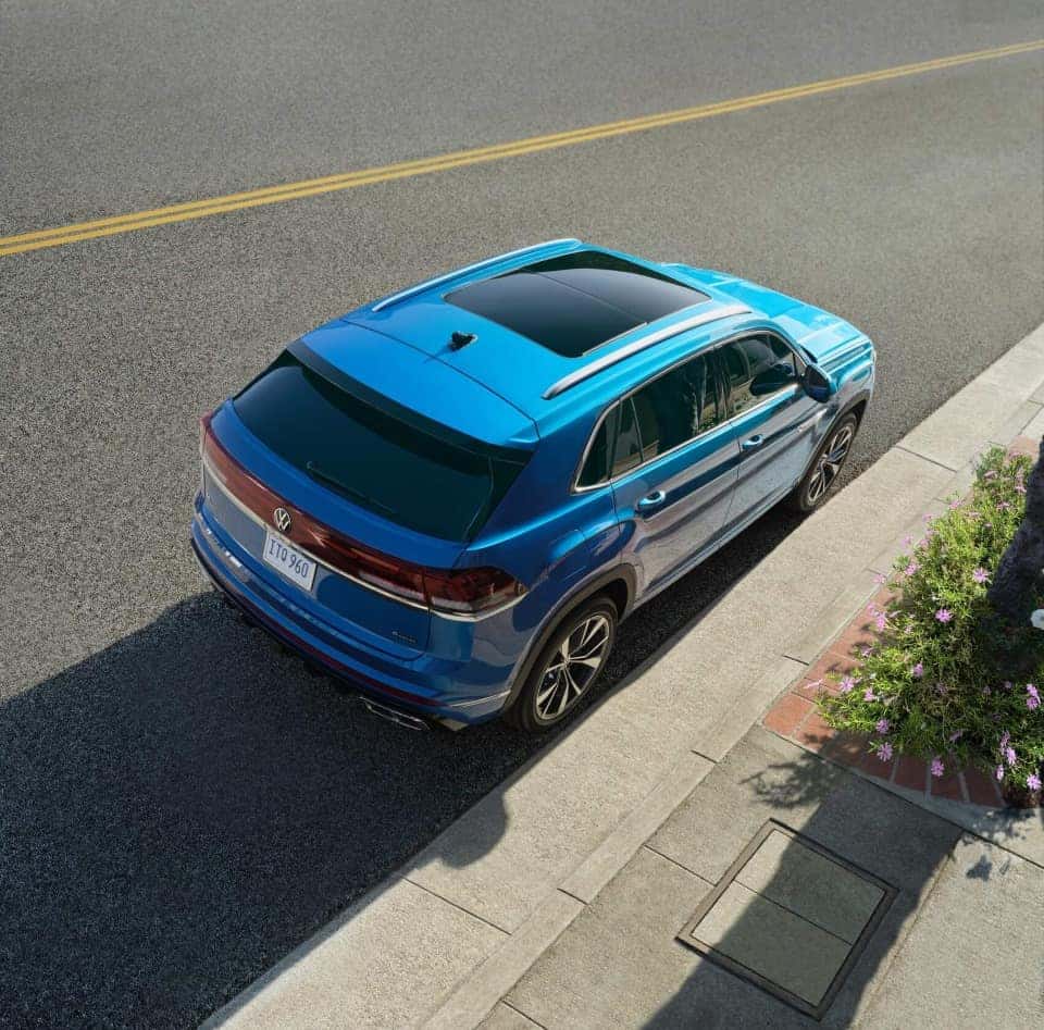 Blue Volkswagen Atlas Cross Sport parked on  street near Kalkaska MI