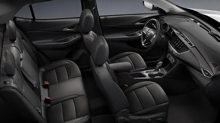 2021 Encore GX Essence (1SL) interior shown in Ebony with available features. CGI asset