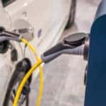 an electric car being charged at a charging station