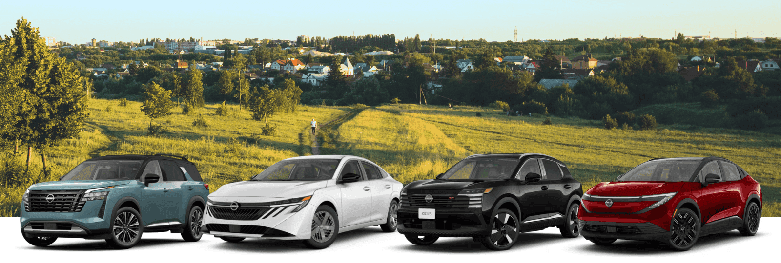Genesis cars lined up against a scenic background